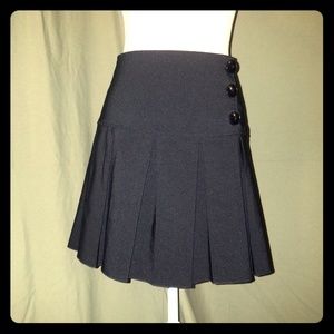 Black pleated mini skirt